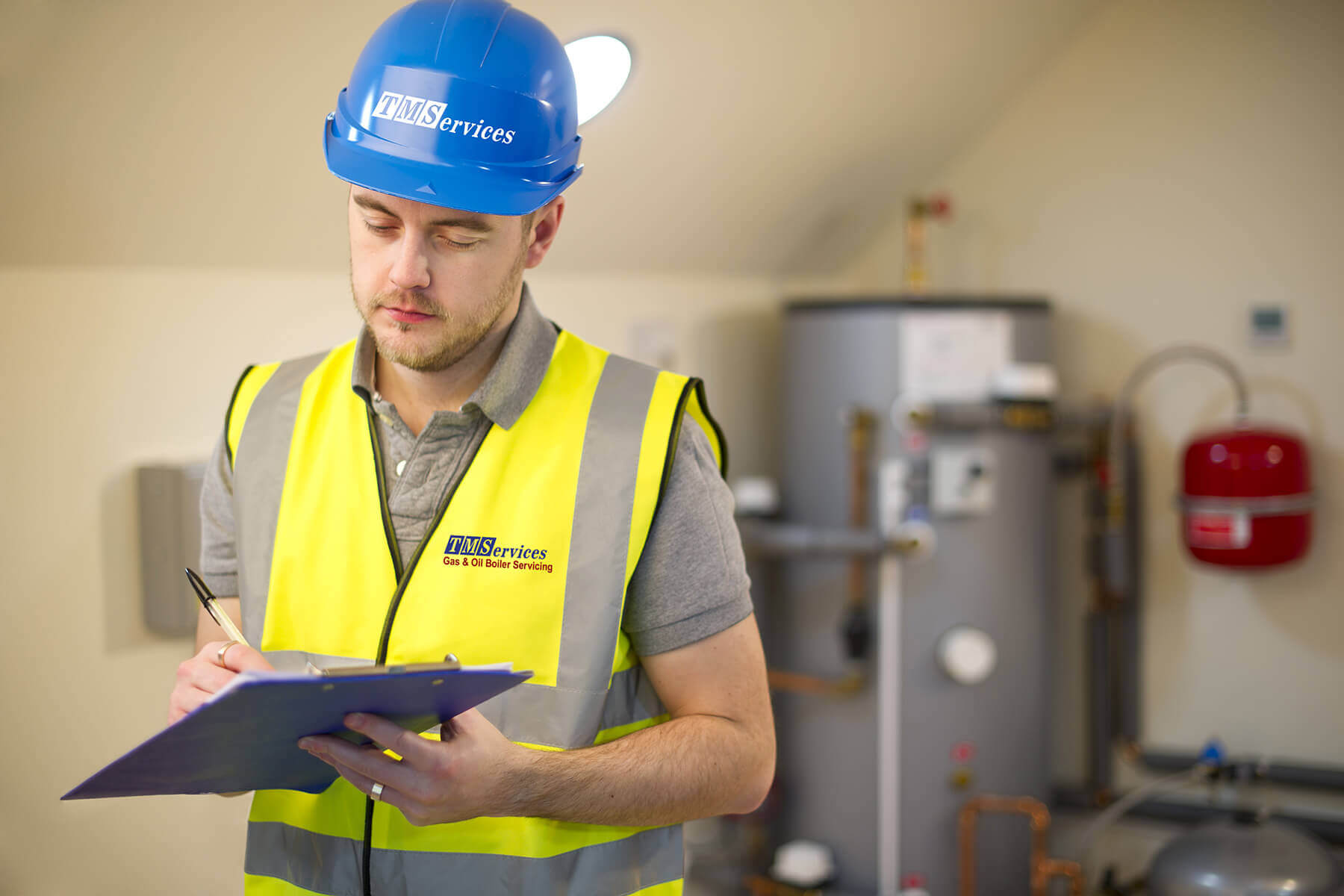 Our TM Services engineer inspecting a domestic boiler